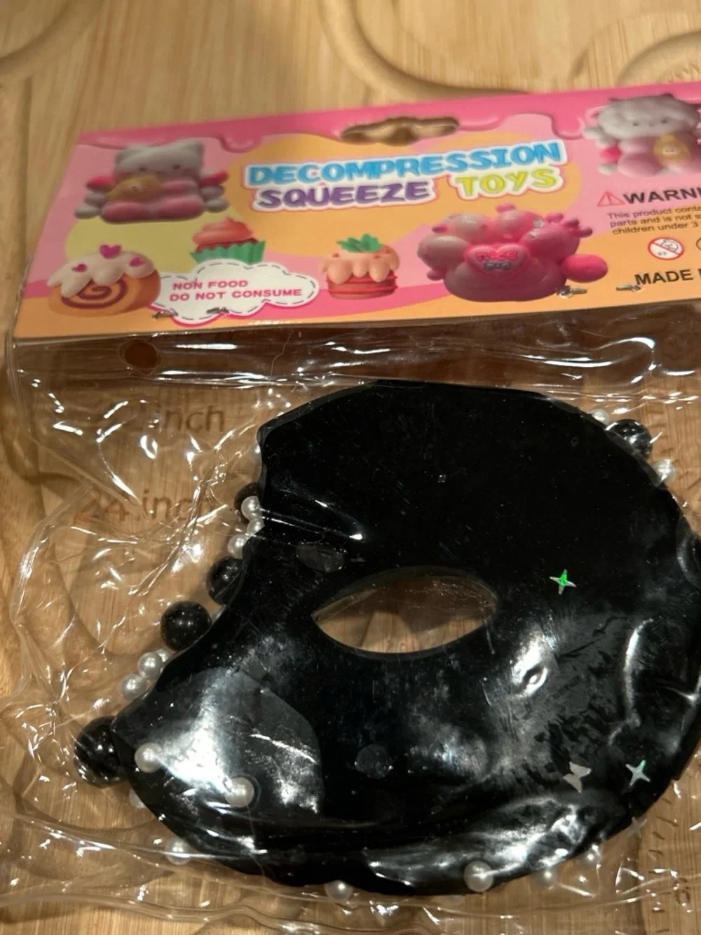Kids Compression Squeeze Toy - White & Black Donut with Star Glitter